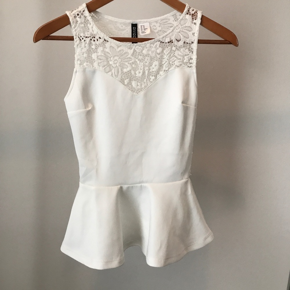 White peplum blouse with lace in back
